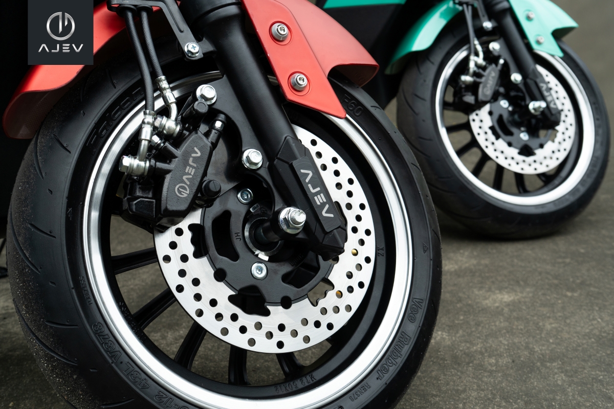 Taurus disc brakes on red and green motorcycles