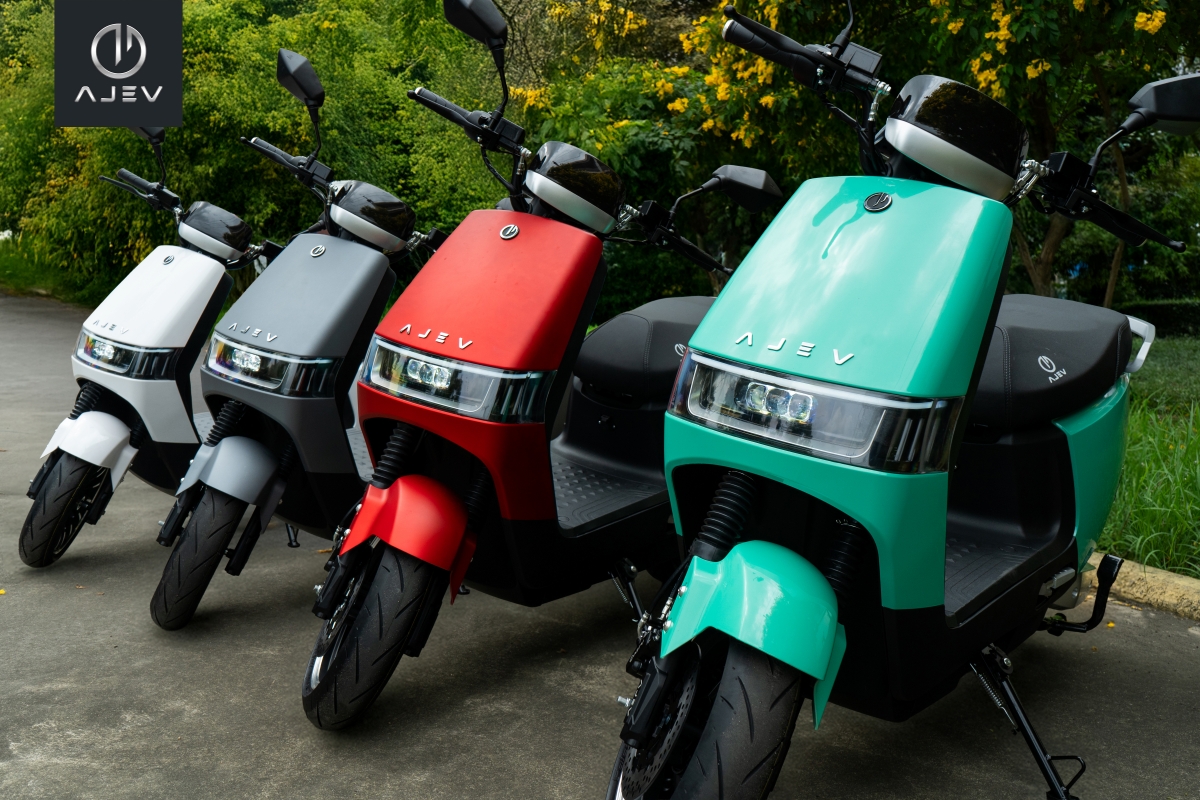 Four Taurus motorcycles showing white, grey, red and mint green